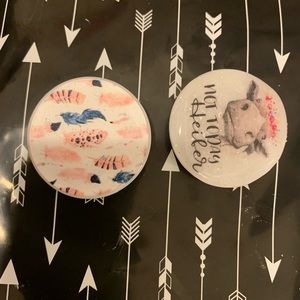 Two custom phone grips